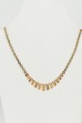 A 9CT GOLD NECKLACE, a yellow gold brick link necklace with fringe detail, fitted with a push pin