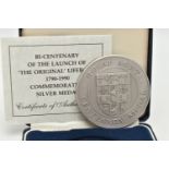 A ROYAL MINT 1990 CASED COMMEMORATIVE STERLING SILVER MEDAL, 153.5 grams, .925 Silver, diameter