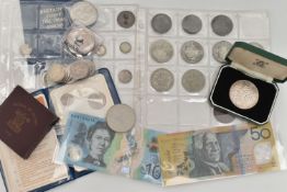 A SMALL CARDBOARD BOX CONTAINING AUSTALIA BANKNOTES WITH MIXED COINAGE, to include a Royal Mint