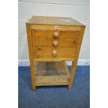 A 20TH CENTURY PINE THREE DRAWER CABINET, with an undershelf, width 55cm x depth 60cm x height