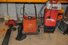 A FLYMO LAWN SCARIFIER, a Grizzly garden shredder and a Performance Power garden blower/vac (all PAT