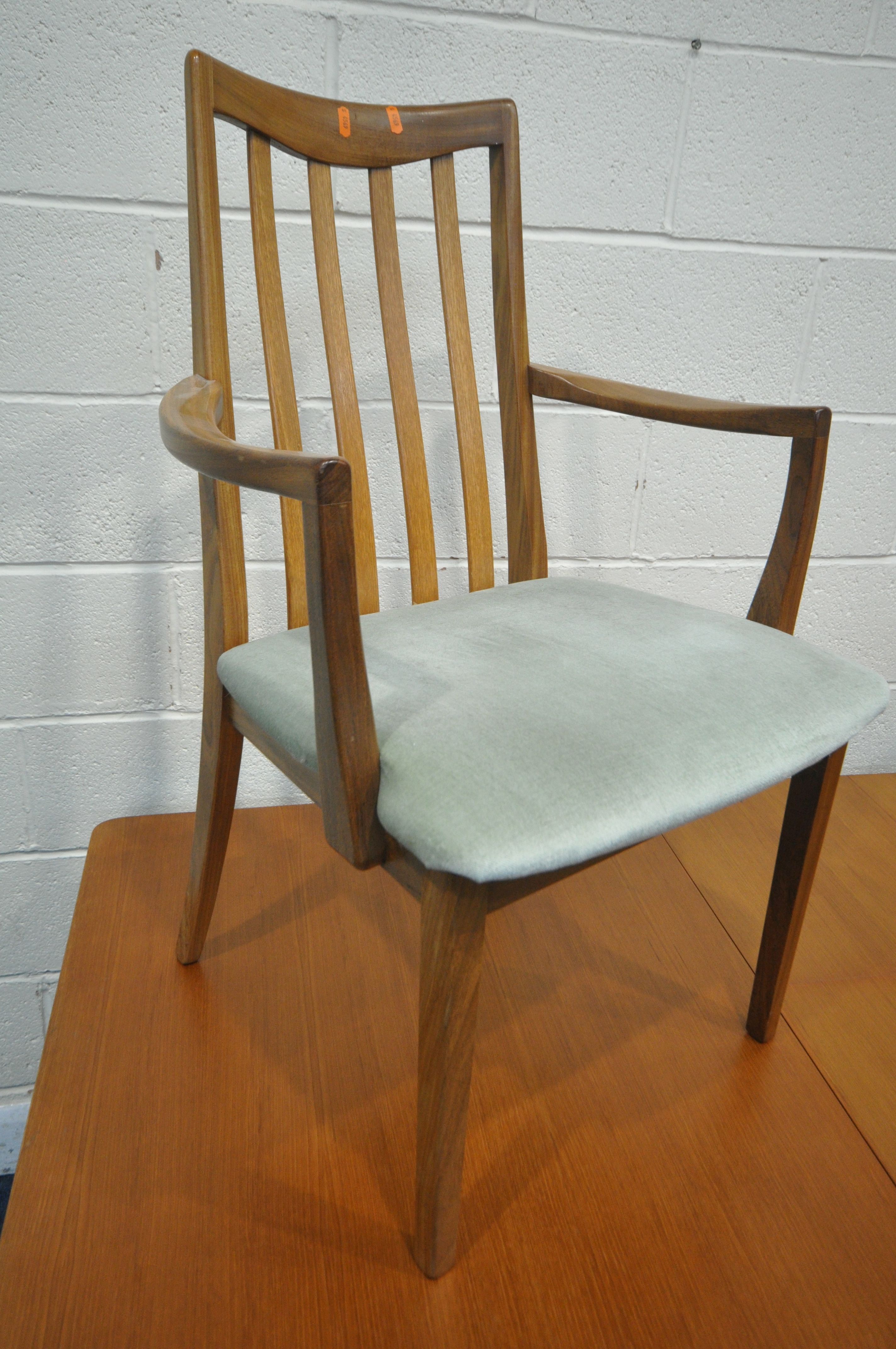 MCINTOSH OF KIRKCALDY, A MID CENTURY TEAK EXTENDING DINING TABLE, with two fold out leaves, raised - Image 2 of 10