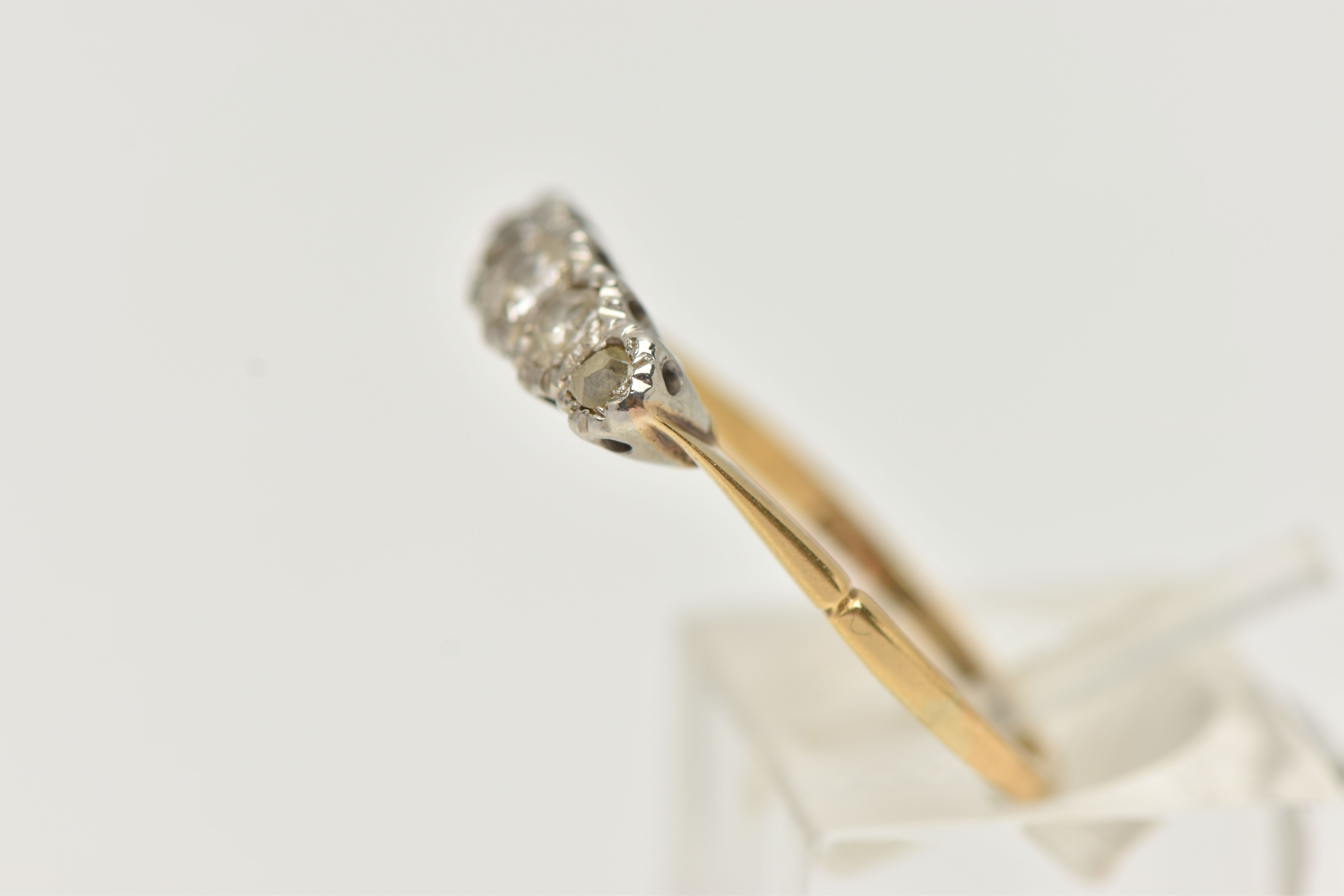A YELLOW AND WHITE METAL DIAMOND FIVE STONE RING, set with five graduated old cut diamonds, - Image 2 of 4