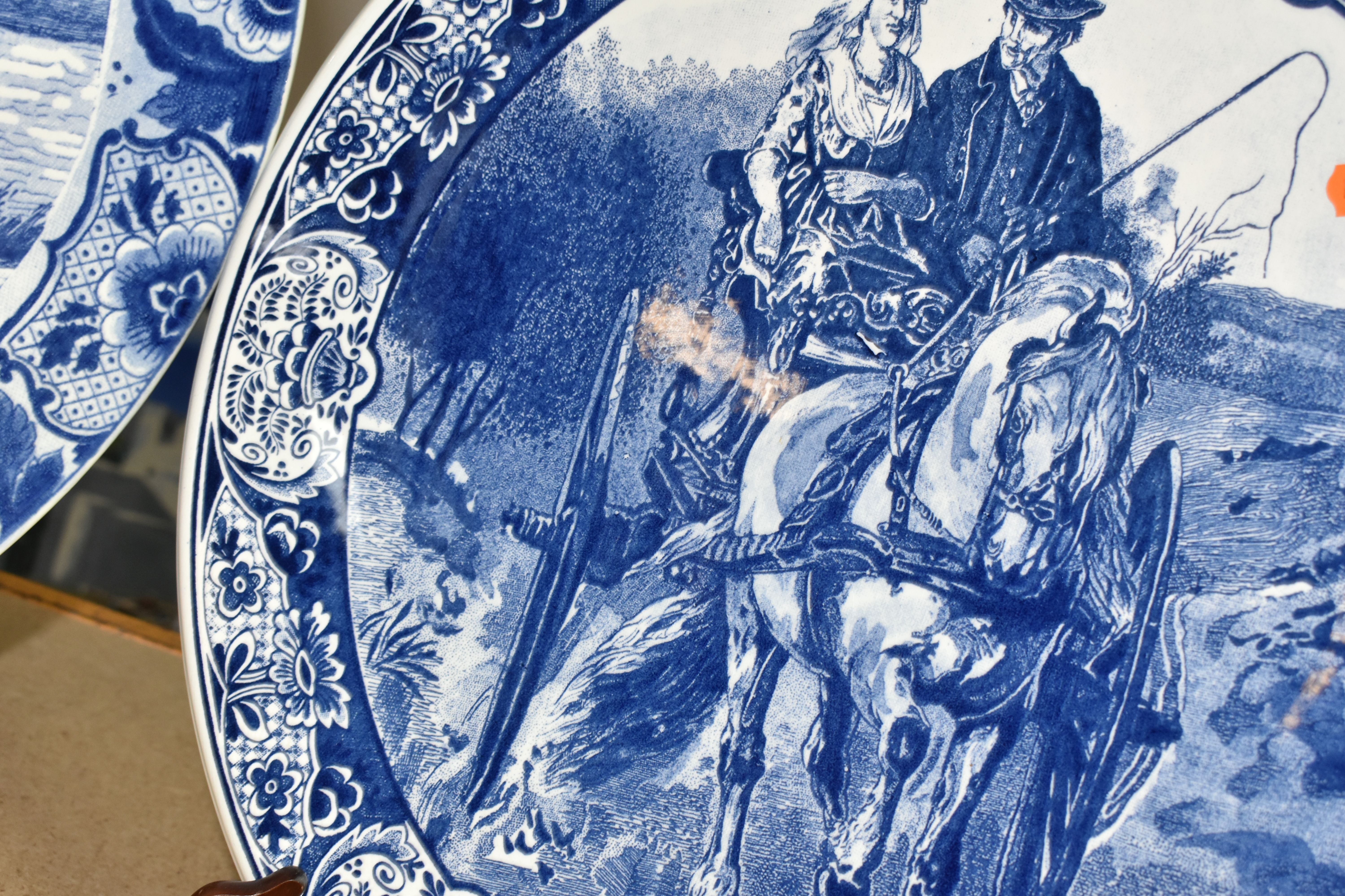 TWO DELFT CHARGERS, blue and white with blue printed Delft mark to the base, depicting a carriage - Image 4 of 5