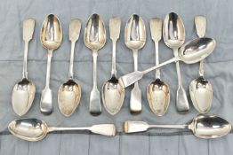 A MATCHED SET OF TWELVE VICTORIAN SILVER FIDDLE PATTERN DESSERT SPOONS, comprising a matching set of