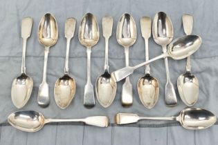 A MATCHED SET OF TWELVE VICTORIAN SILVER FIDDLE PATTERN DESSERT SPOONS, comprising a matching set of