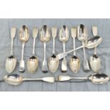 A MATCHED SET OF TWELVE VICTORIAN SILVER FIDDLE PATTERN DESSERT SPOONS, comprising a matching set of