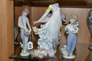 THREE LLADRO FIGURINES, comprising 'Tulip Garden' model no. 7712, a 1989 Collector's Society