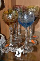 A SET OF SIX HOCK GLASSES AND A VILLEROY & BOCH STOPPER, the hock glasses with coloured bowls in
