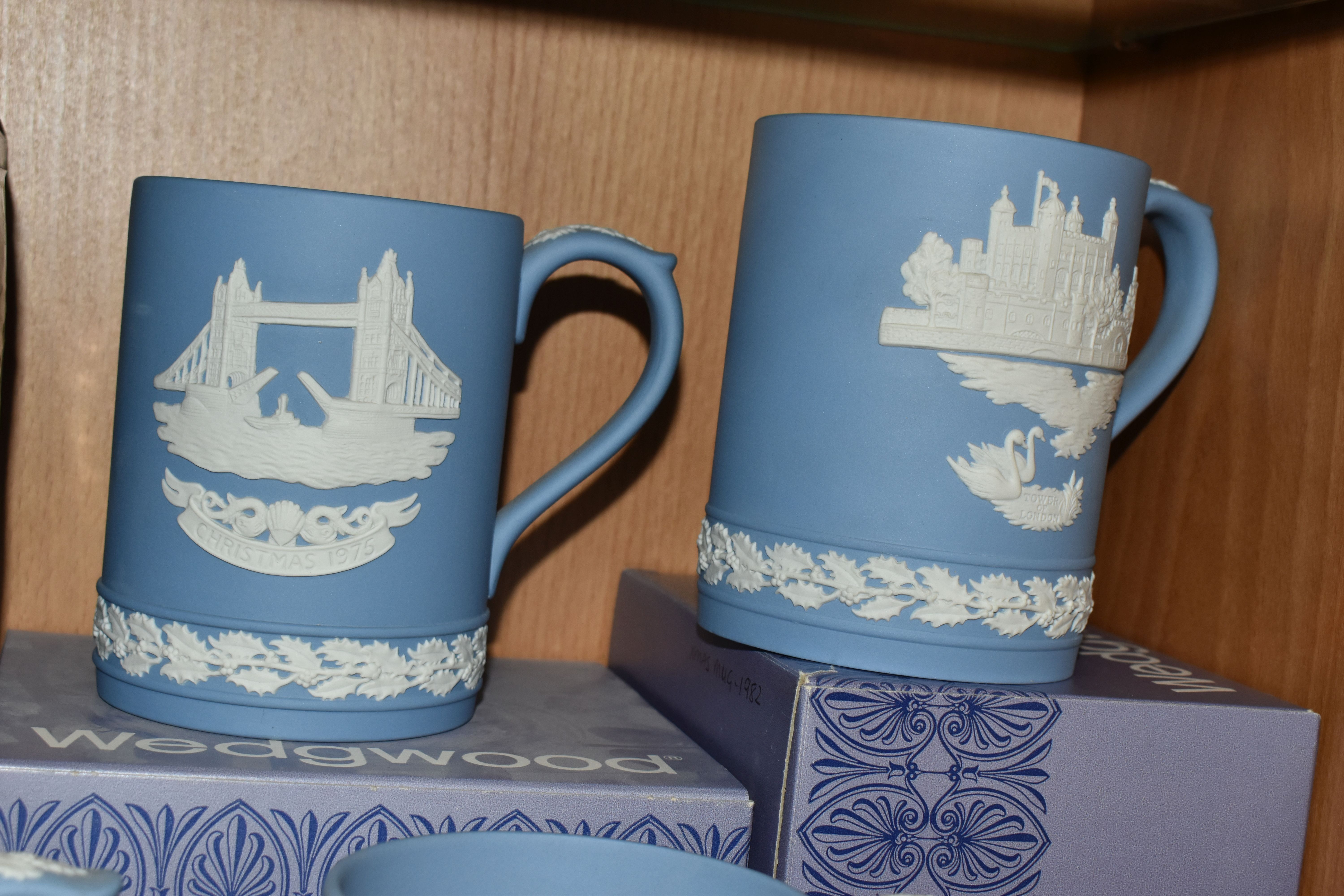 FIFTEEN WEDGWOOD JASPERWARE CHRISTMAS MUGS, in pale blue, decorated with Royal Palaces and London - Image 5 of 6