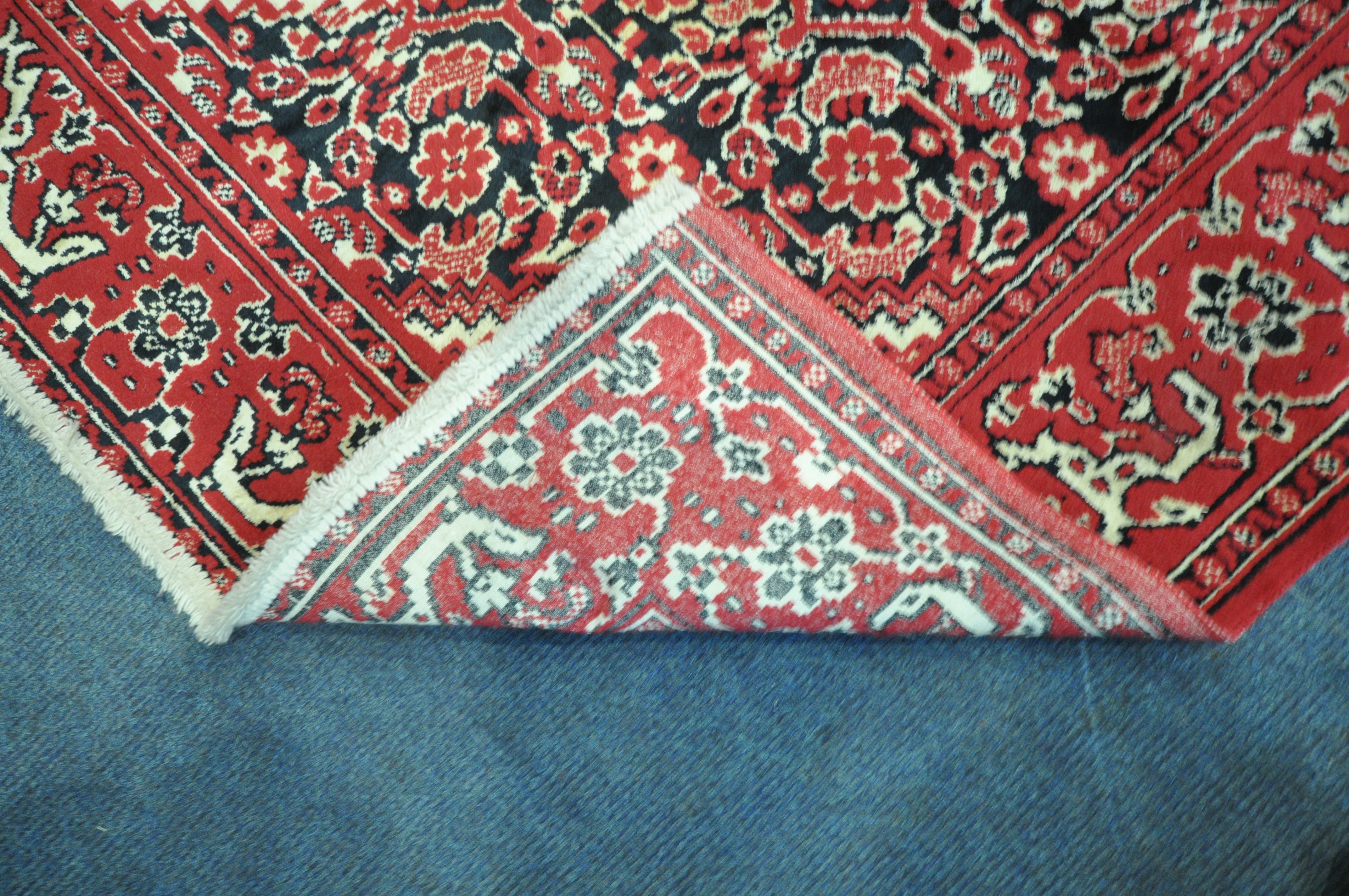 A RED GROUND SYNTHETIC SILK RUG, with central medallion, foliate designs and multi-strap border, - Image 4 of 5