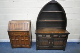 AN OLD CHARM OAK DRESSER, the arched two tier plate rack, atop a base with two linenfold drawers and