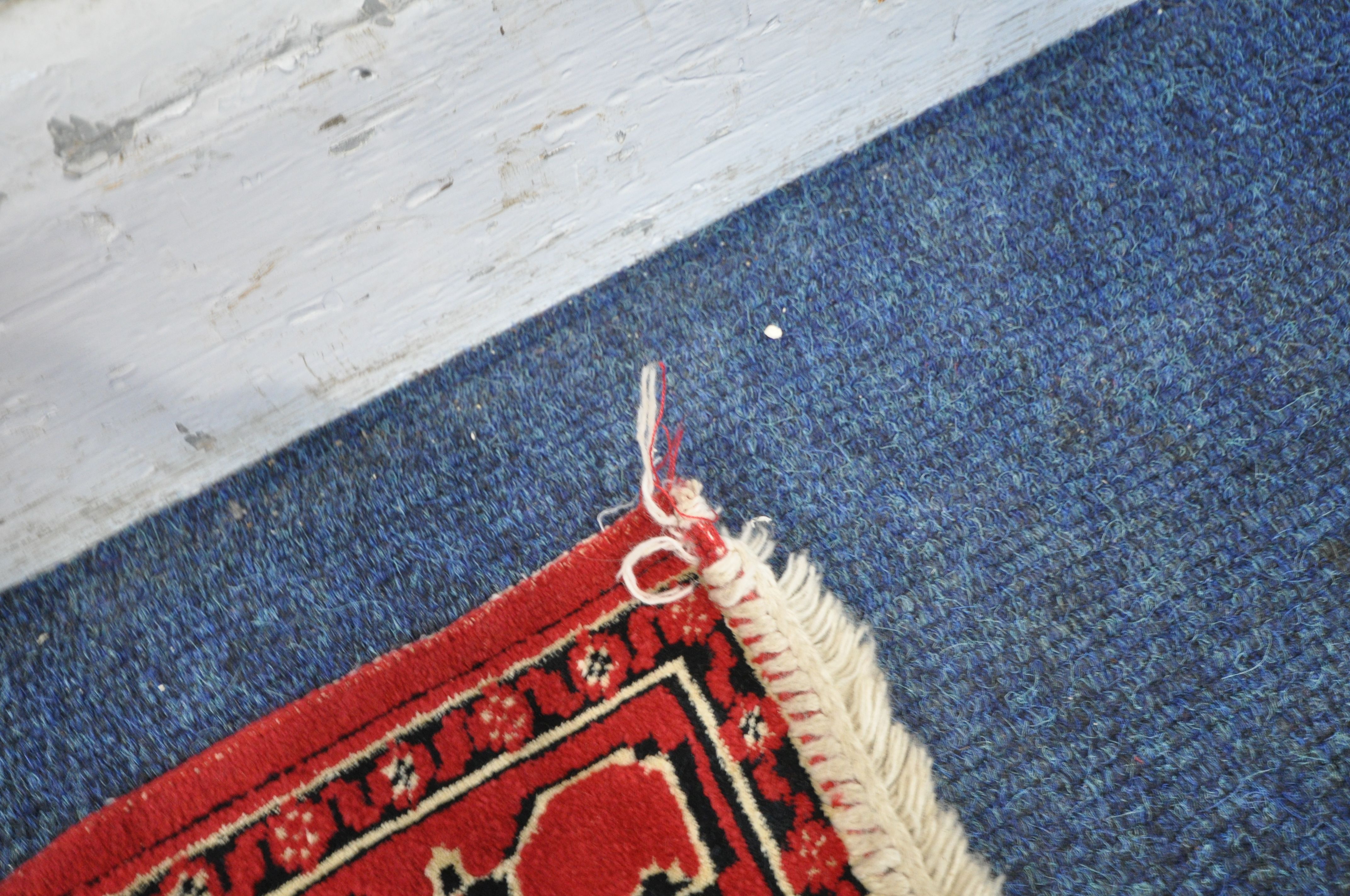 A RED GROUND SYNTHETIC SILK RUG, with central medallion, foliate designs and multi-strap border, - Image 5 of 5