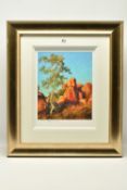 ROLF HARRIS (AUSTRALIAN 1930-2023) 'SINGLE GUM TREE AND DEVIL'S MARBLES', a limited edition print on