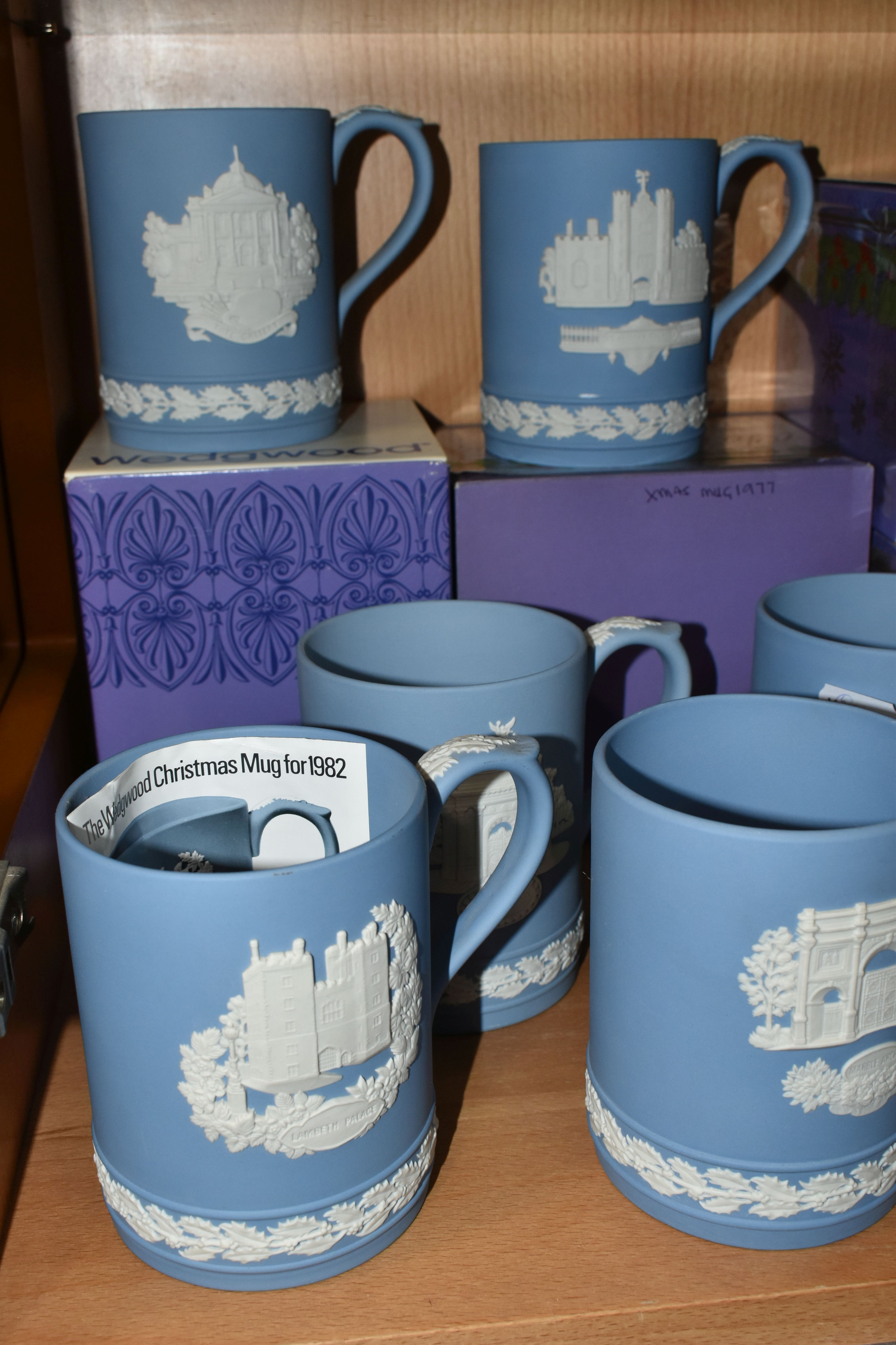 FIFTEEN WEDGWOOD JASPERWARE CHRISTMAS MUGS, in pale blue, decorated with Royal Palaces and London - Image 2 of 6