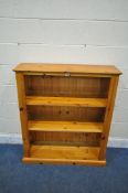 A MODERN PINE OPEN BOOKCASE, with two adjustable shelves, width 97cm x depth 30cm x height 111cm (