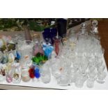 A QUANTITY OF GLASS WARE, to include a selection of drinking glasses and other crystal items by