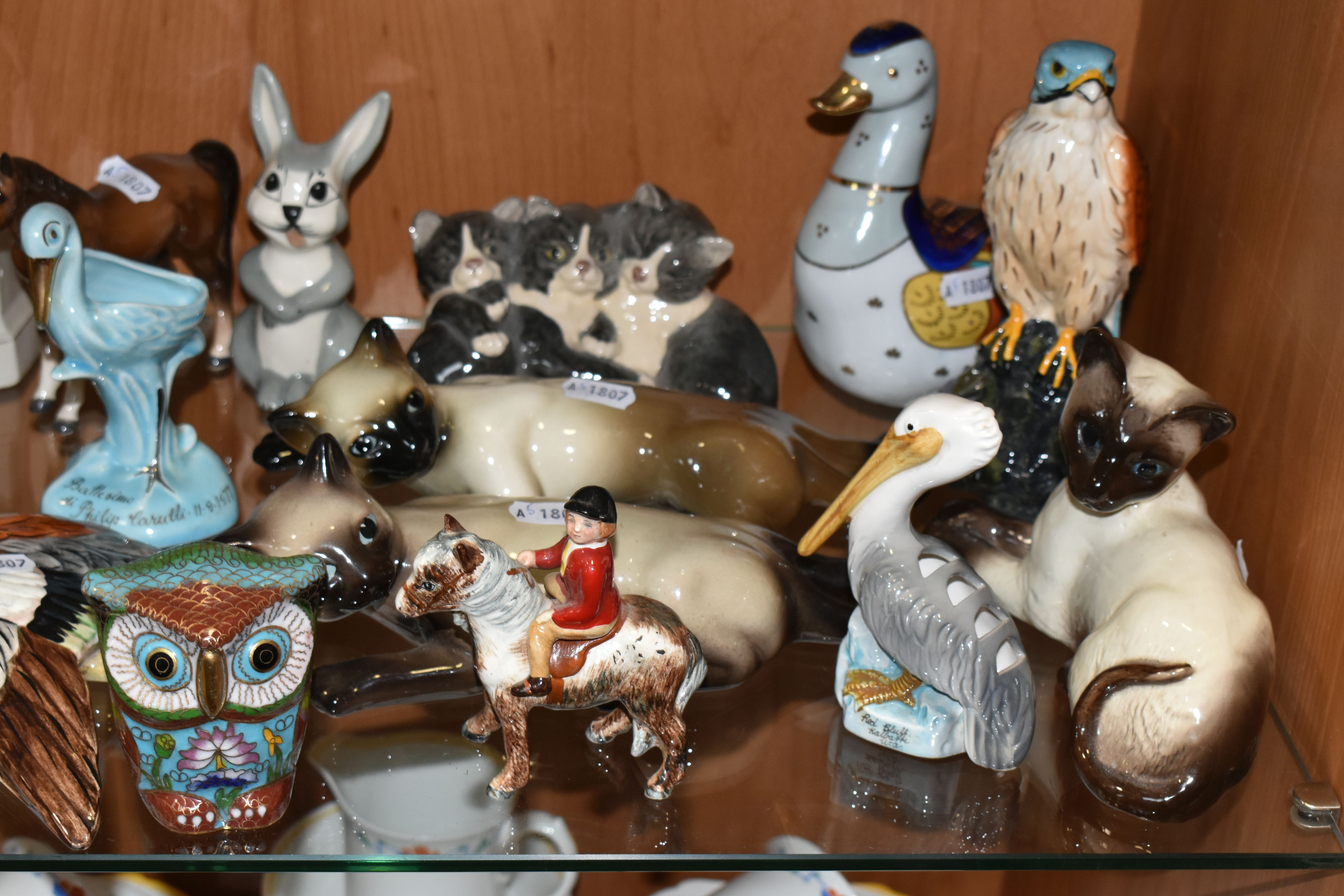 A COLLECTION OF ANIMAL AND BIRD FIGURES, over twenty pieces, to include a Beswick lying down Siamese - Image 3 of 11