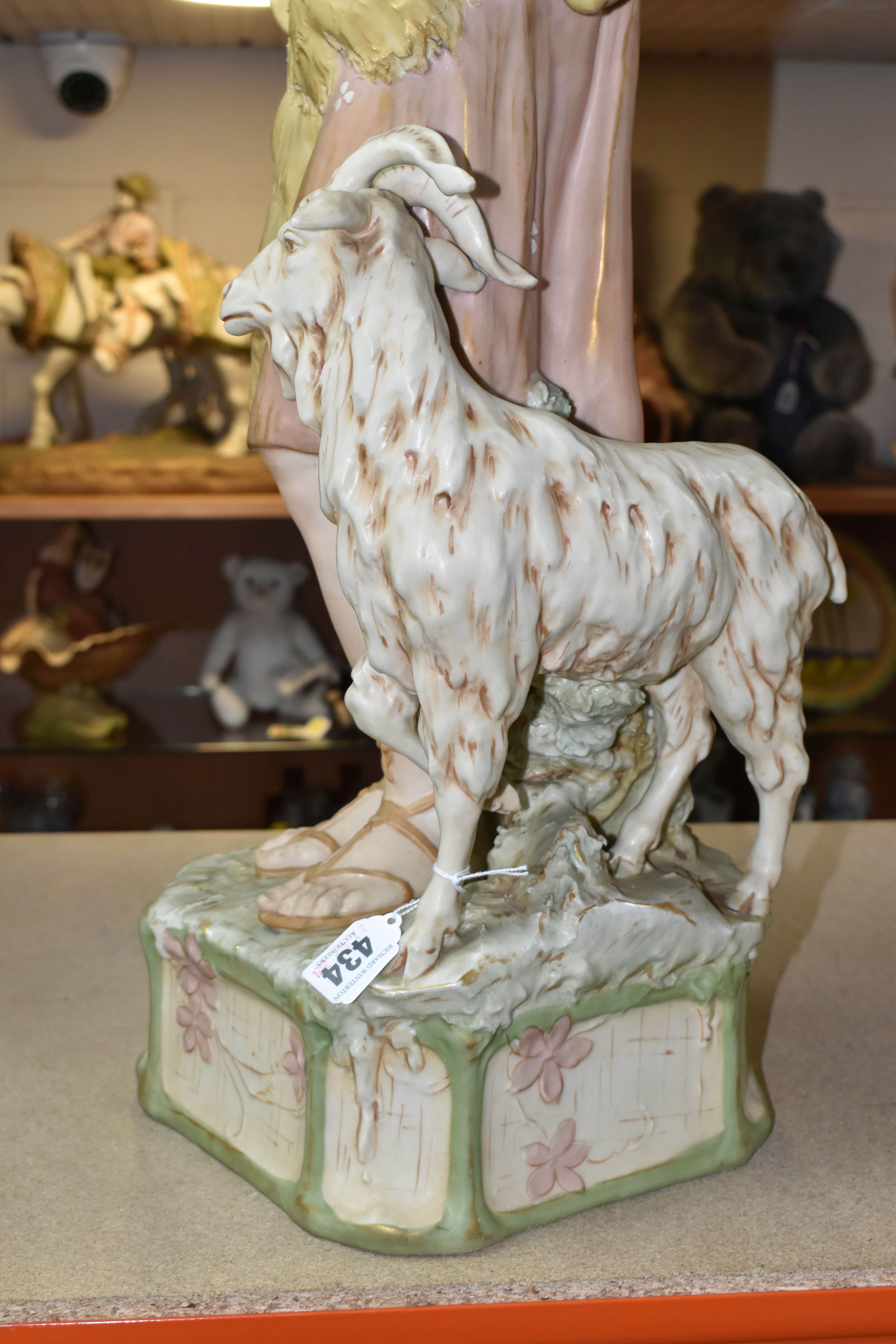 A ROYAL DUX SCULPTURE OF A GOATHERD WITH A GOAT, pink makers mark and impressed numbers 1061 to - Image 9 of 10