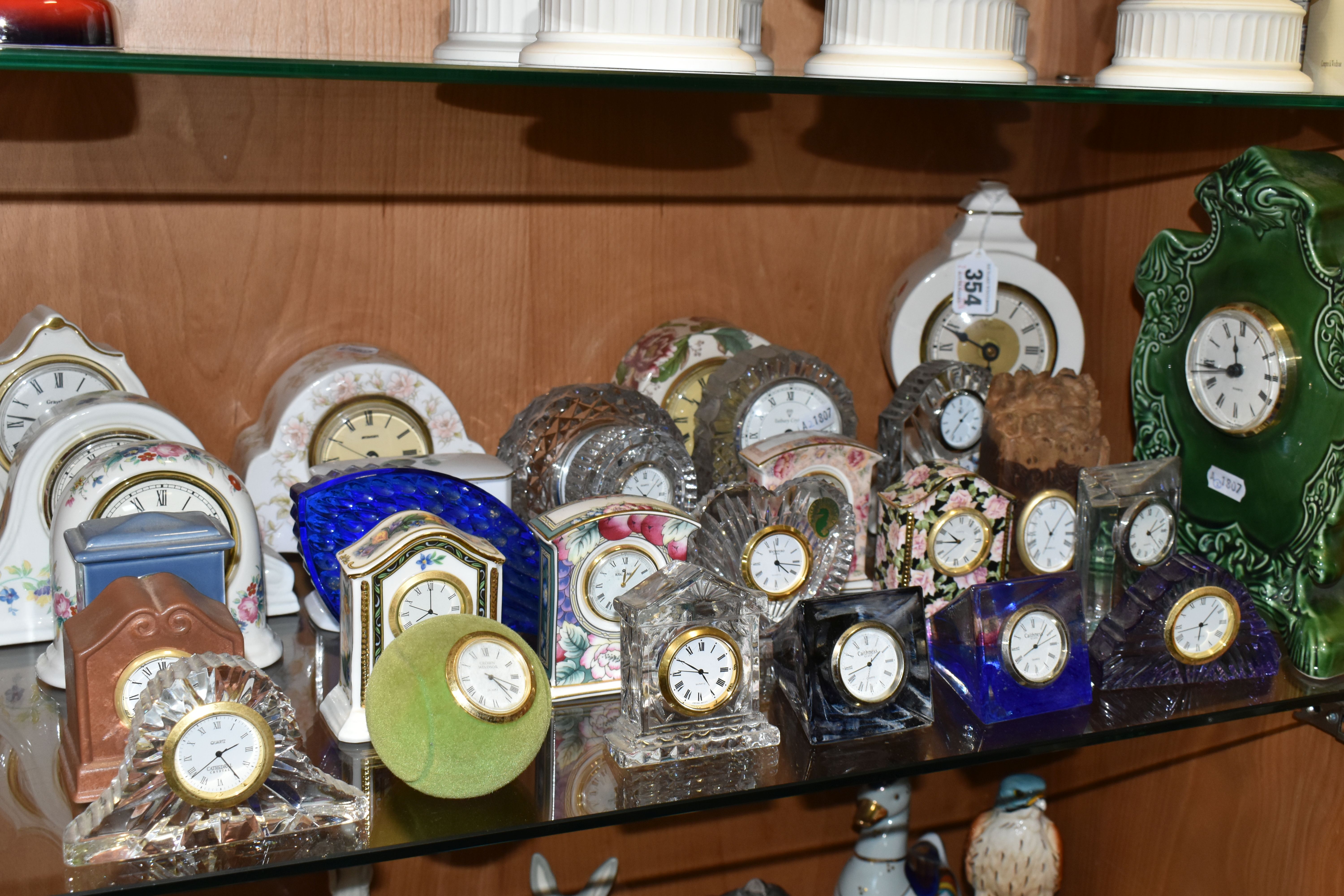 TWENTY EIGHT ROYAL DOULTON, WATERFORD, CAITHNESS AND OTHER GIFTWARE QUARTZ CLOCKS, including Royal