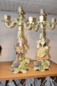 A PAIR OF PLAUE FIGURAL CANDELABRA, the four sconce candelabra decorated with detailed modelled