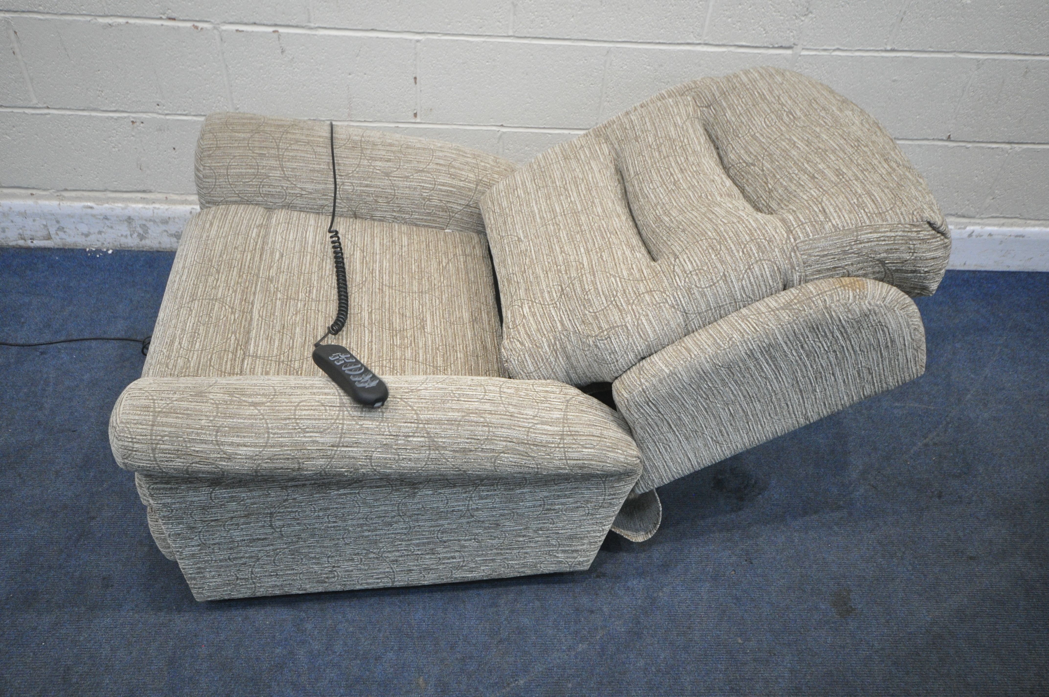 AN UNBRANDED BEIGE UPHOLSTERED RISE AND RECLINE ARMCHAIR, width 90cm x depth 90cm x height 105cm ( - Image 4 of 6