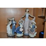 A GROUP OF FOUR LLADRO FIGURINES, comprising Let's Make Up, no.5555, sculpted by Juan Huerta, issued