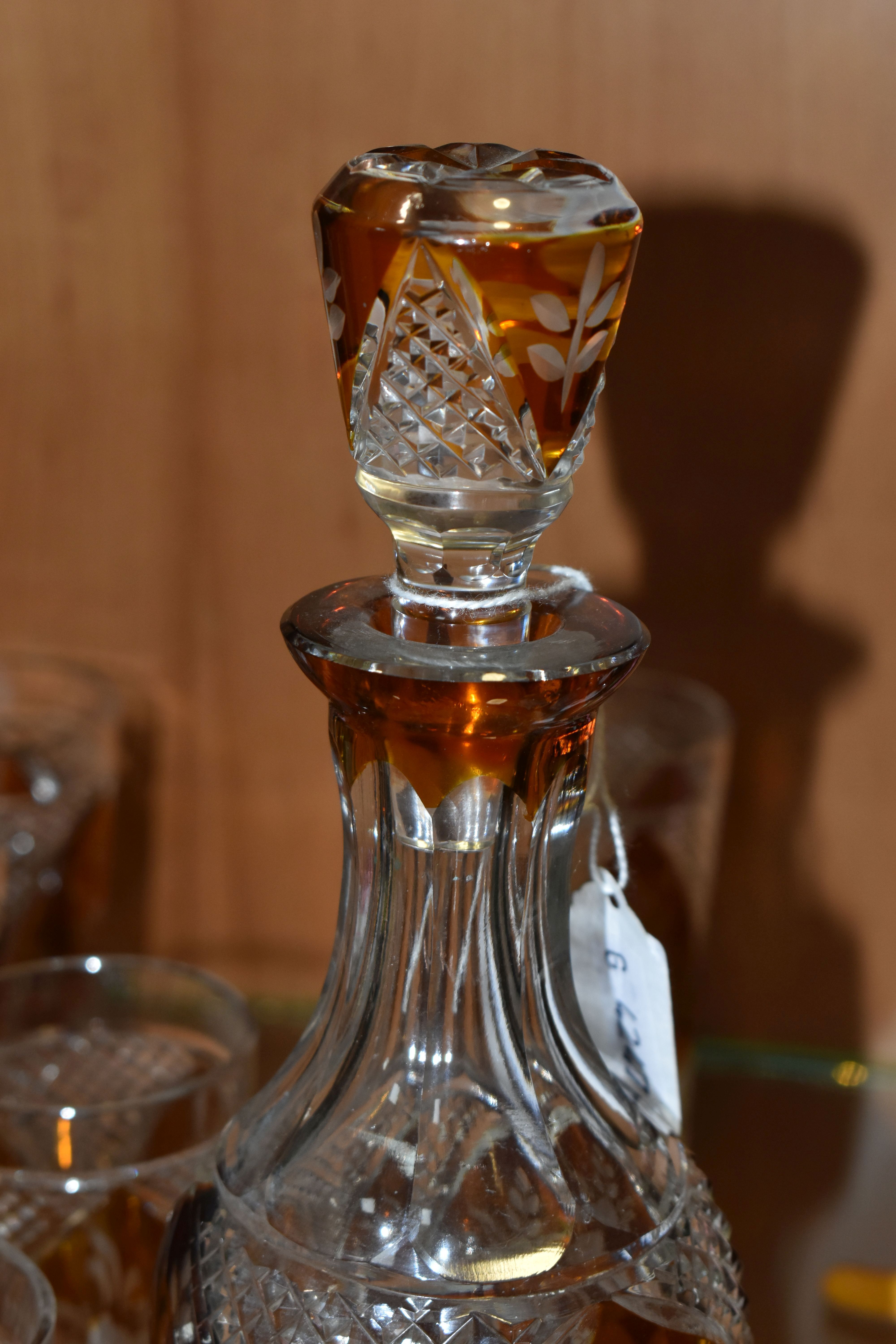 A CONTINENTAL AMBER CUT TO CLEAR DECANTER AND GLASSES, the part set incudes mallet form decanter - Image 5 of 7