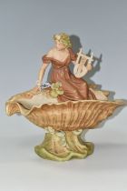 A ROYAL DUX CENTREPIECE, depicting a lady seated on a shell with a lute, model no 1932, base bearing