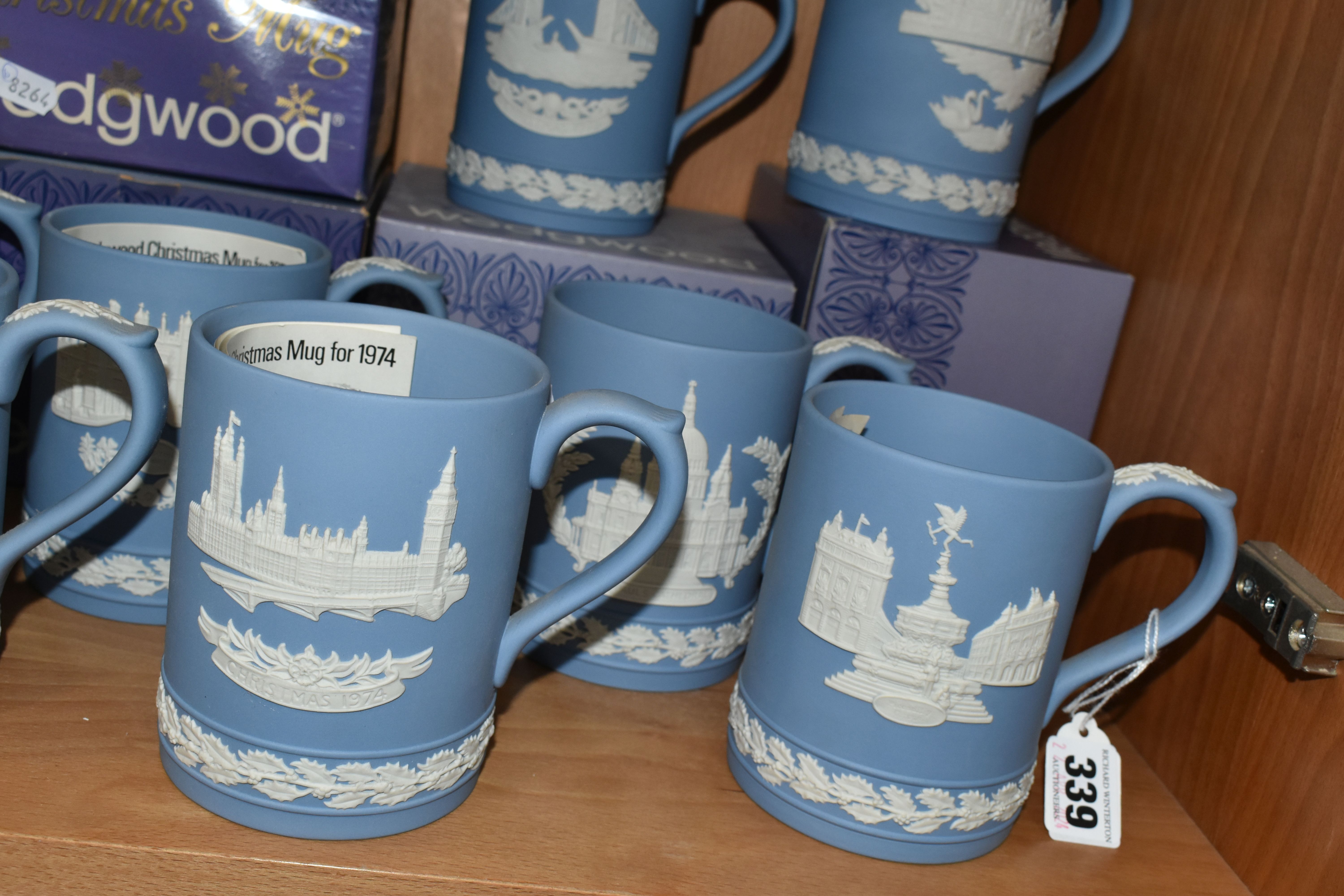 FIFTEEN WEDGWOOD JASPERWARE CHRISTMAS MUGS, in pale blue, decorated with Royal Palaces and London - Image 4 of 6