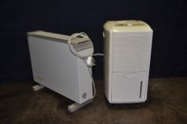 A DP TOOL DEHUMIDIFIER, a Consort Consair heater and a Russel Hobbs microwave (all PAT pass and