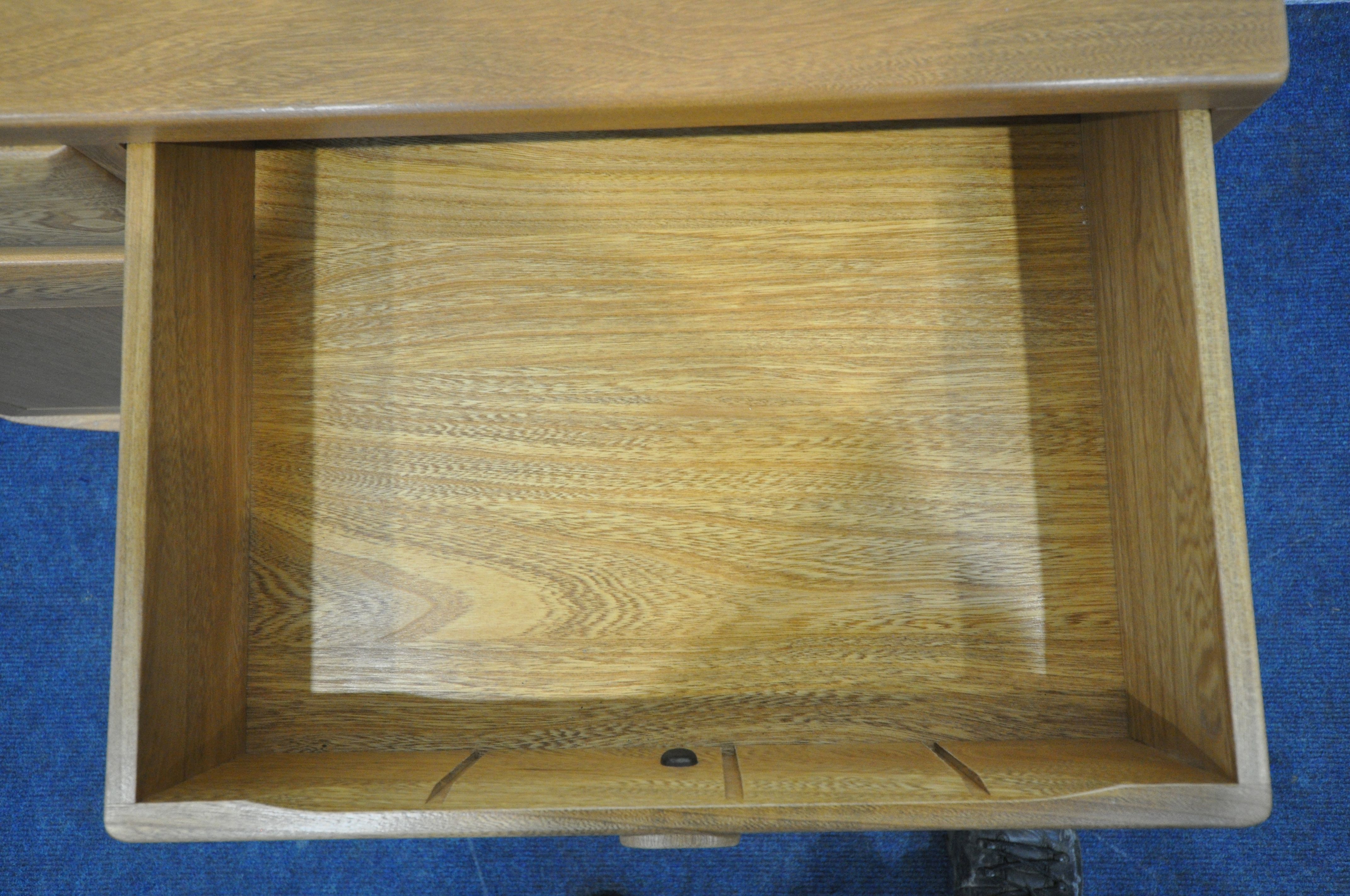 AN ERCOL WINDSOR ELM AND BEECH CABINET, fitted with two drawers, above two cupboard doors, width - Bild 4 aus 4