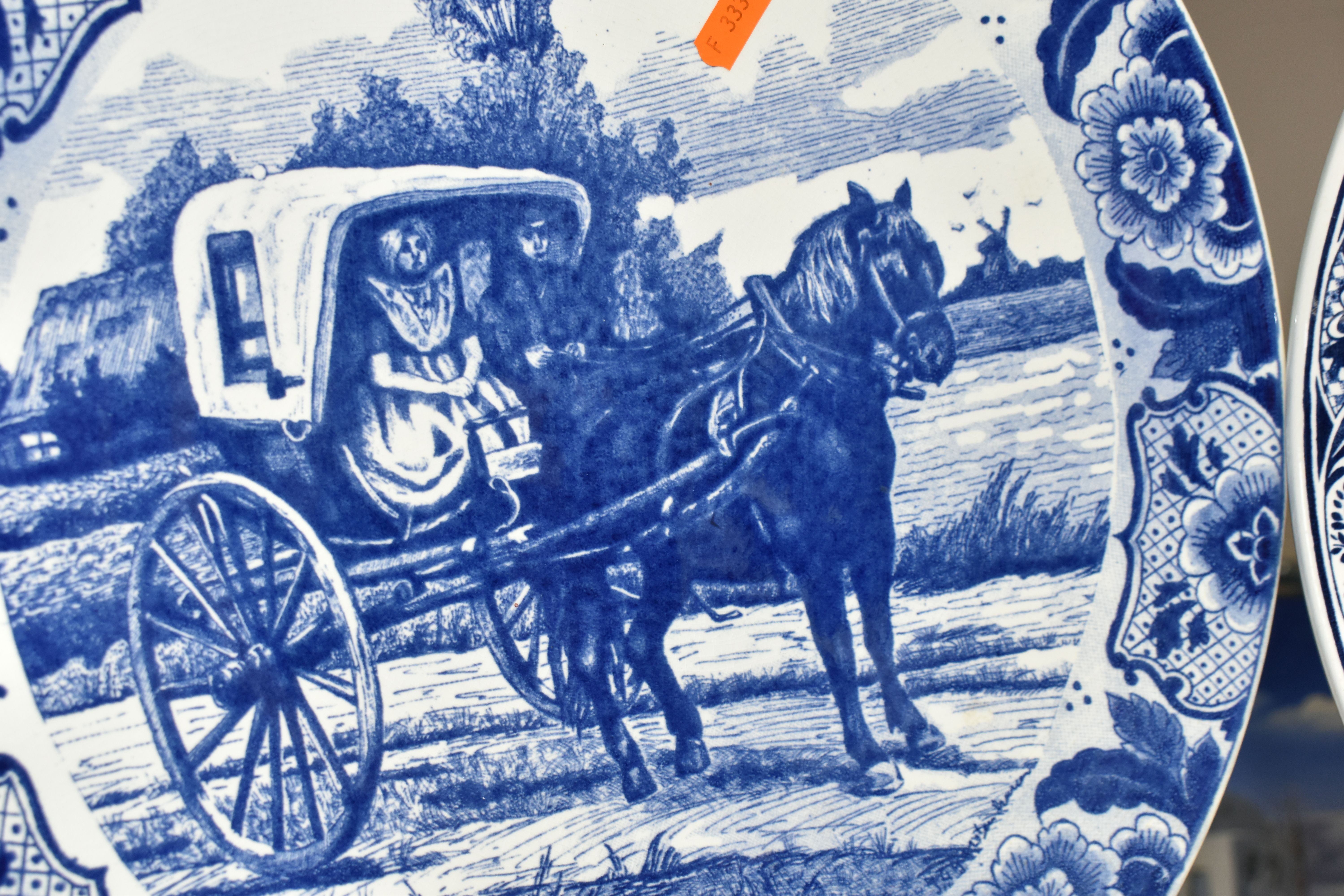 TWO DELFT CHARGERS, blue and white with blue printed Delft mark to the base, depicting a carriage - Image 3 of 5