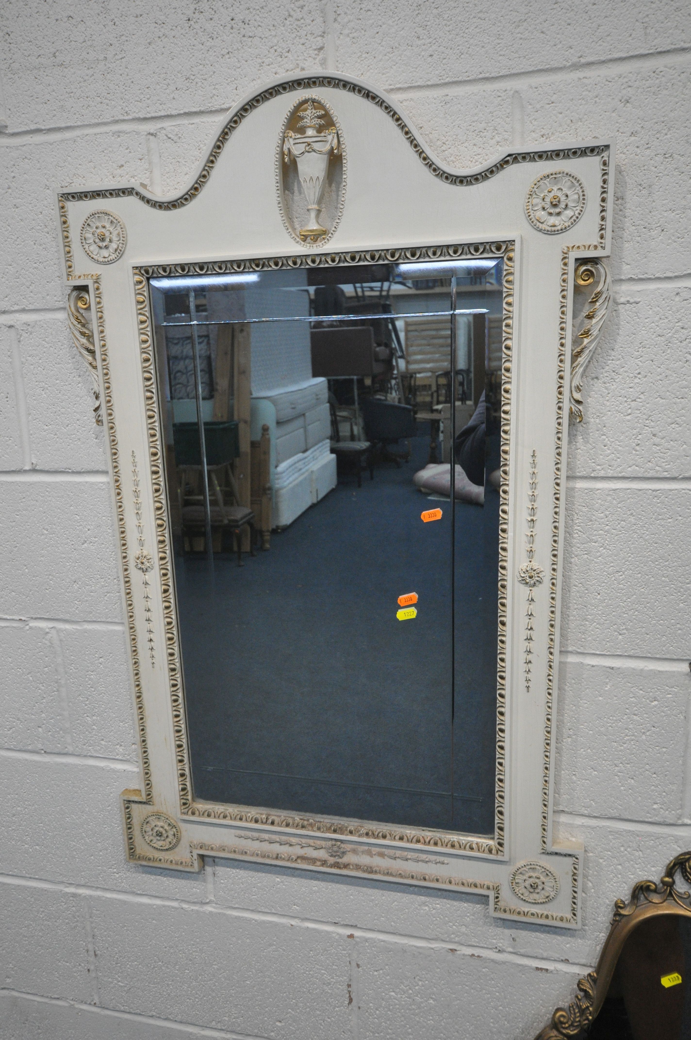 A GILT METAL FRAMED WALL MIRROR, with scrolled and foliate details, 50cm x 110cm, a French wall - Image 4 of 5