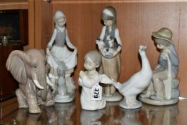 SIX LLADRO, NAO AND SIMILAR FIGURES, comprising Lladro: Painful Elephant no 5020, issued 1978 -