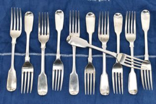 A MATCHED SET OF ELEVEN VICTORIAN SILVER FIDDLE PATTERN DESSERT FORKS, comprising a set of seven