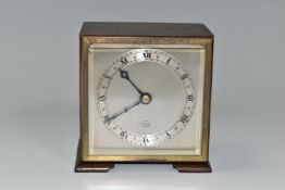 A SMALL ELLIOTT MANTEL CLOCK, the case square in form, raised on two tapering feet, the dial