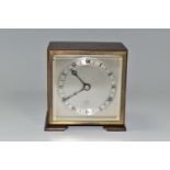 A SMALL ELLIOTT MANTEL CLOCK, the case square in form, raised on two tapering feet, the dial