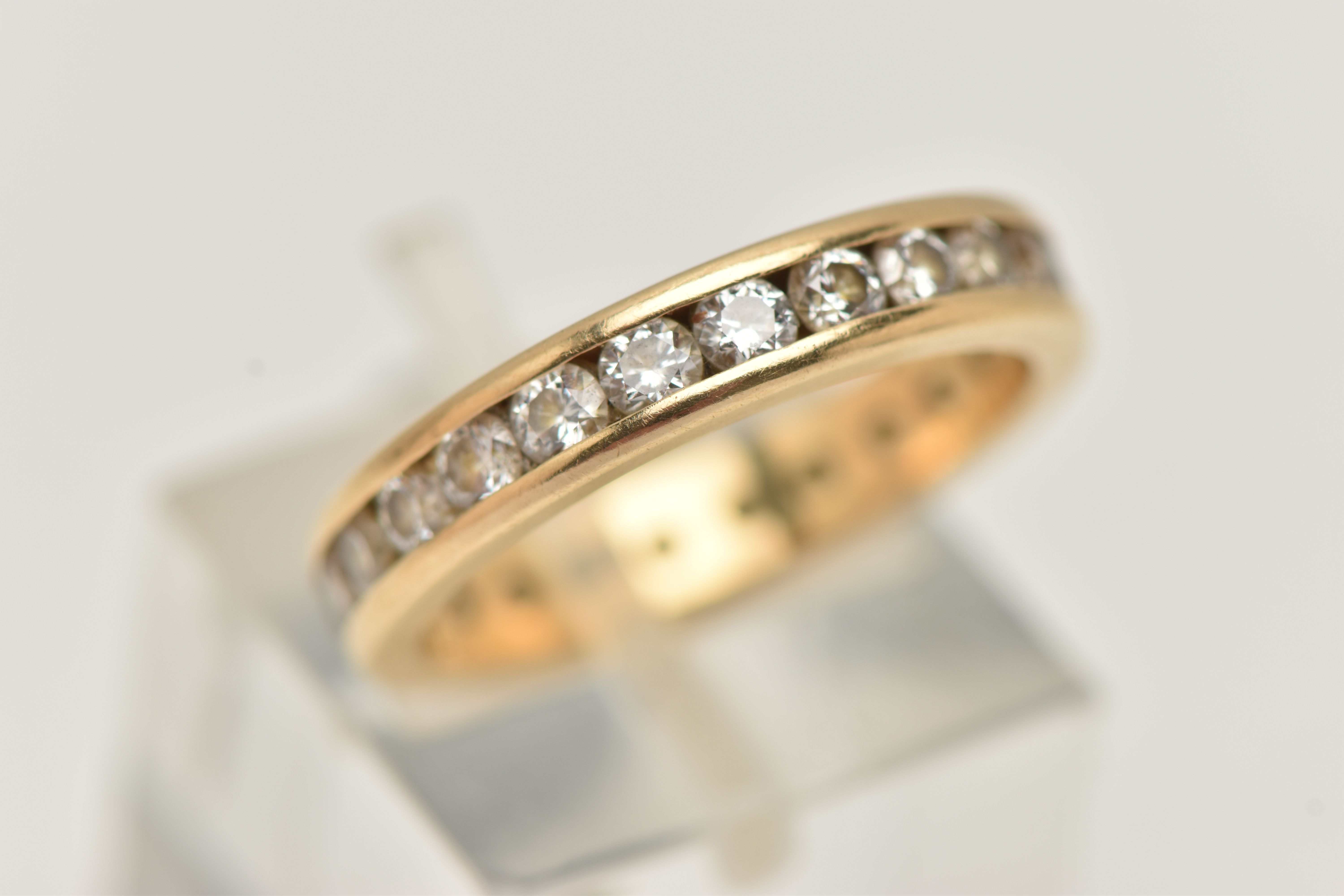AN 18CT GOLD DIAMOND FULL ETERNITY BAND RING, channel set with twenty four round brilliant cut - Image 4 of 4