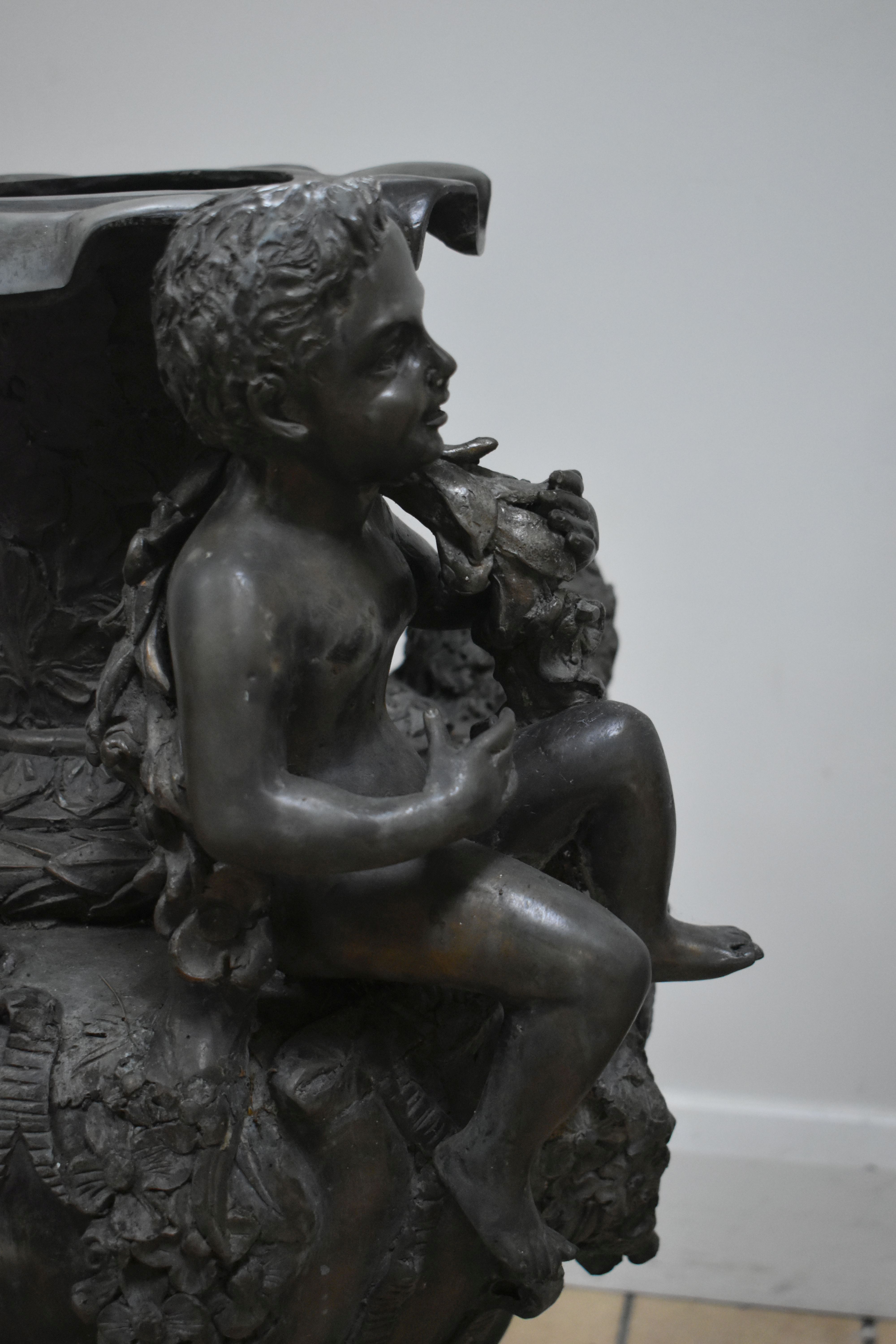 A PAIR OF SECOND HALF 20TH CENTURY WEATHERED BRONZE URNS, cast with two seated putti, two female - Image 10 of 15