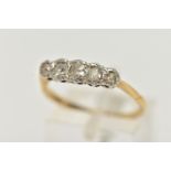 A YELLOW AND WHITE METAL DIAMOND FIVE STONE RING, set with five graduated old cut diamonds,