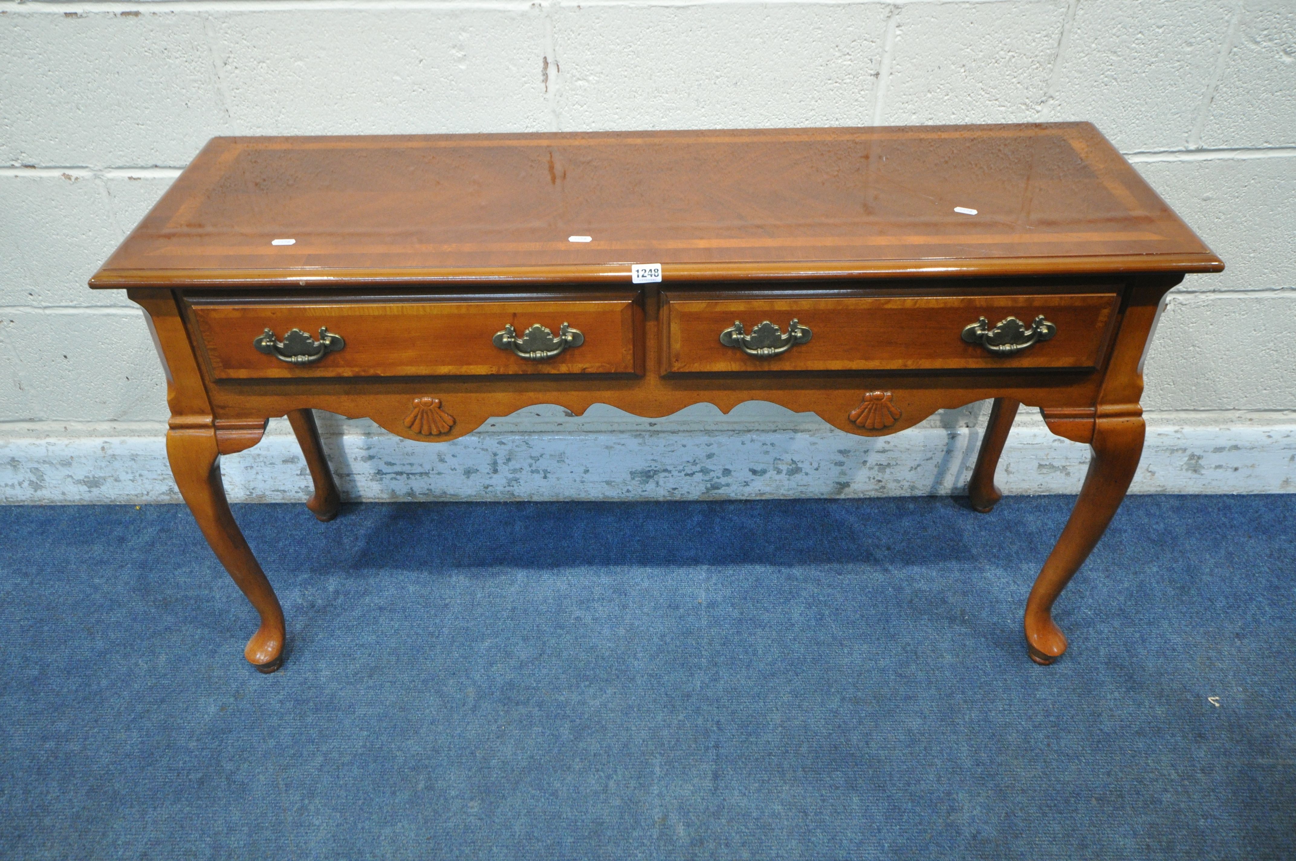 AN ITALIAN REPRODUCTION RECTANGULAR SIDE TABLE, with two frieze drawers, wavy apron, raised on