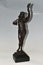 A HOLLOWCAST BRONZE SCULPTURE OF A MALE FIGURE, he is holding a horn in his right hand and a flaming