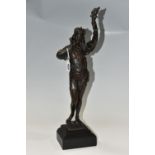 A HOLLOWCAST BRONZE SCULPTURE OF A MALE FIGURE, he is holding a horn in his right hand and a flaming