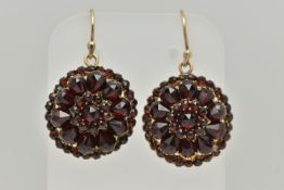 A PAIR OF BOHEMIAN GARNET DROP EARRINGS, designed as three tiers of faceted garnets to the later