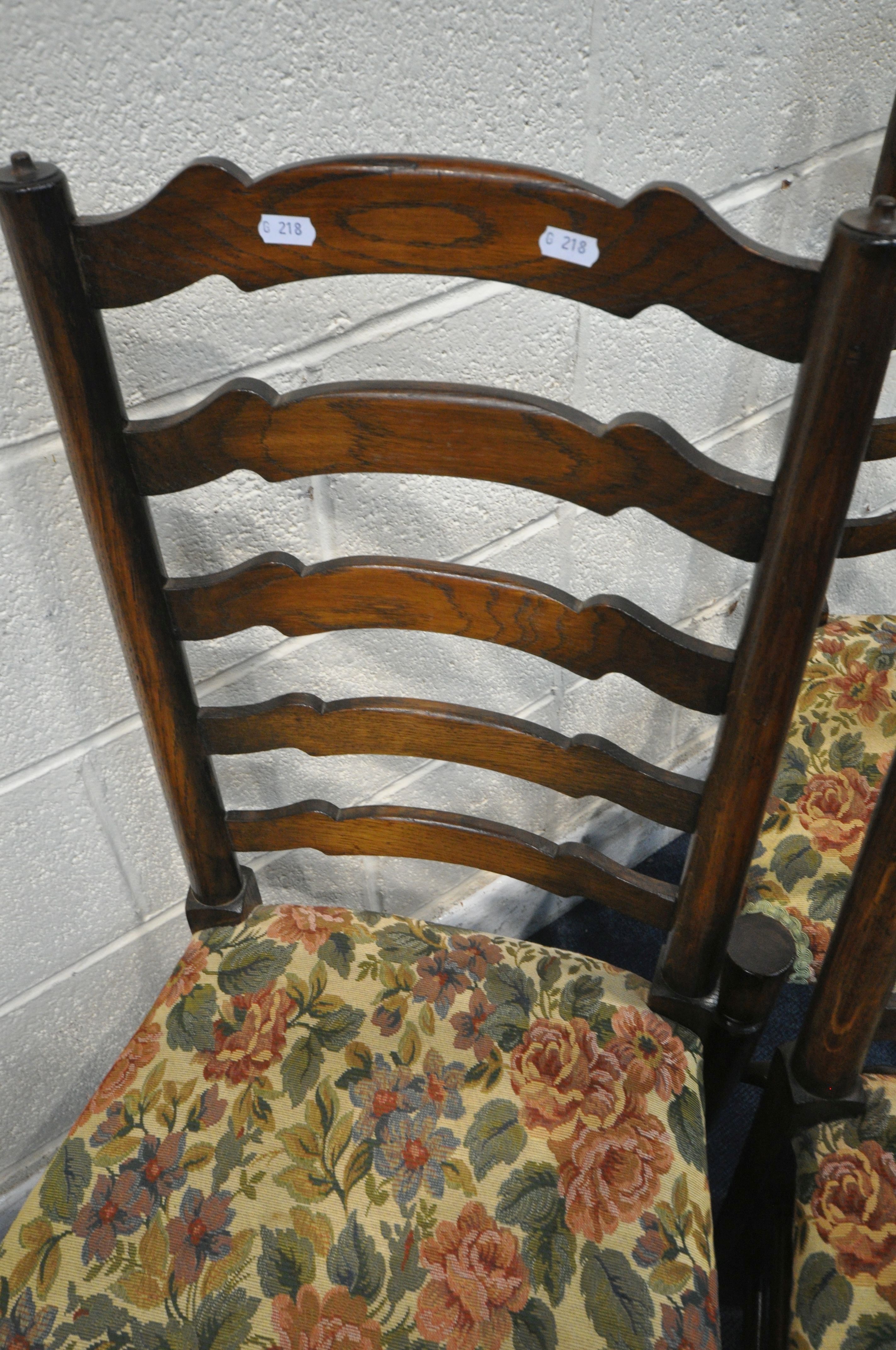 A SET OF SIX OAK LADDER BACK CHAIRS, with beige and floral upholstery, on turned legs and stretchers - Image 3 of 4