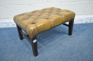 A 20TH CENTURY FOOTSTOOL, with tanned leather buttoned upholstery, raised on square tapered legs,