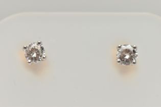 A PAIR OF 18CT GOLD DIAMOND STUD EARRINGS, round brilliant cut diamonds, approximate total diamond
