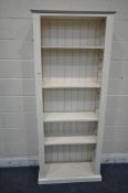 A WHITE PAINTED PINE OPEN BOOKCASE, with four adjustable shelves, width 81cm x depth 30cm x height