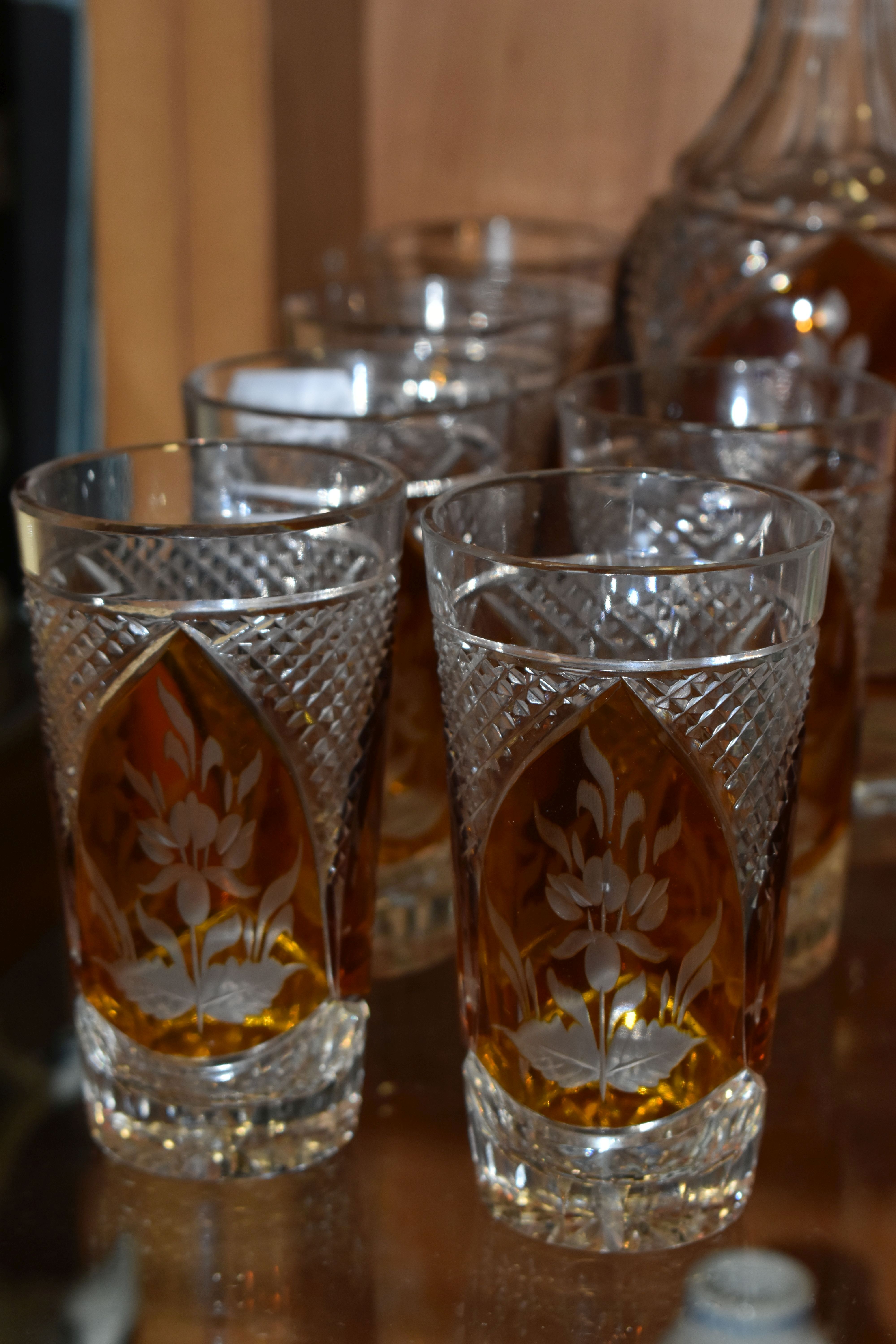 A CONTINENTAL AMBER CUT TO CLEAR DECANTER AND GLASSES, the part set incudes mallet form decanter - Image 3 of 7